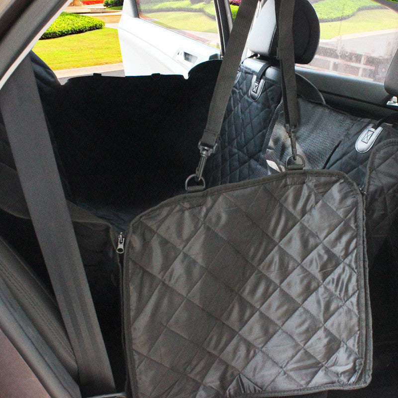 Quilted waterproof dog car seat cover with side flaps and adjustable straps for secure backseat protection.