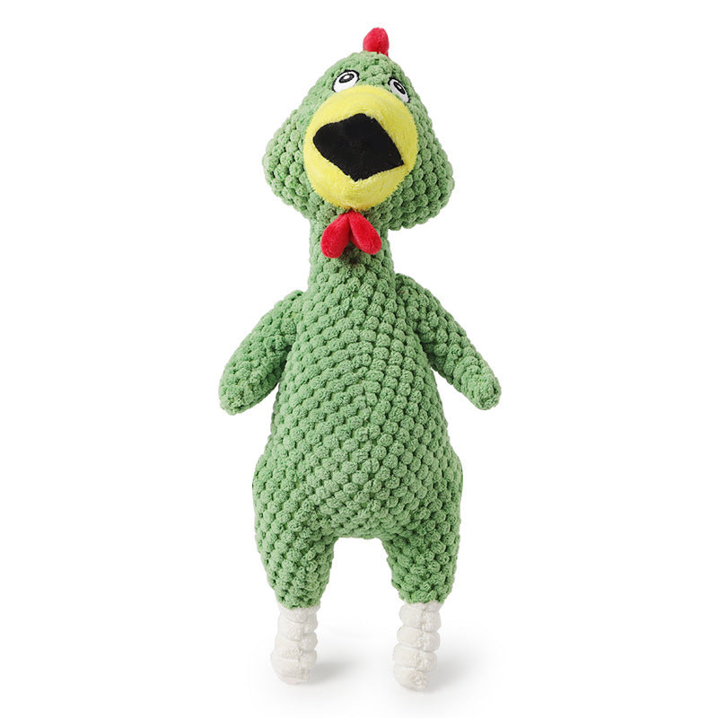 Green crochet toy with a face on a white background