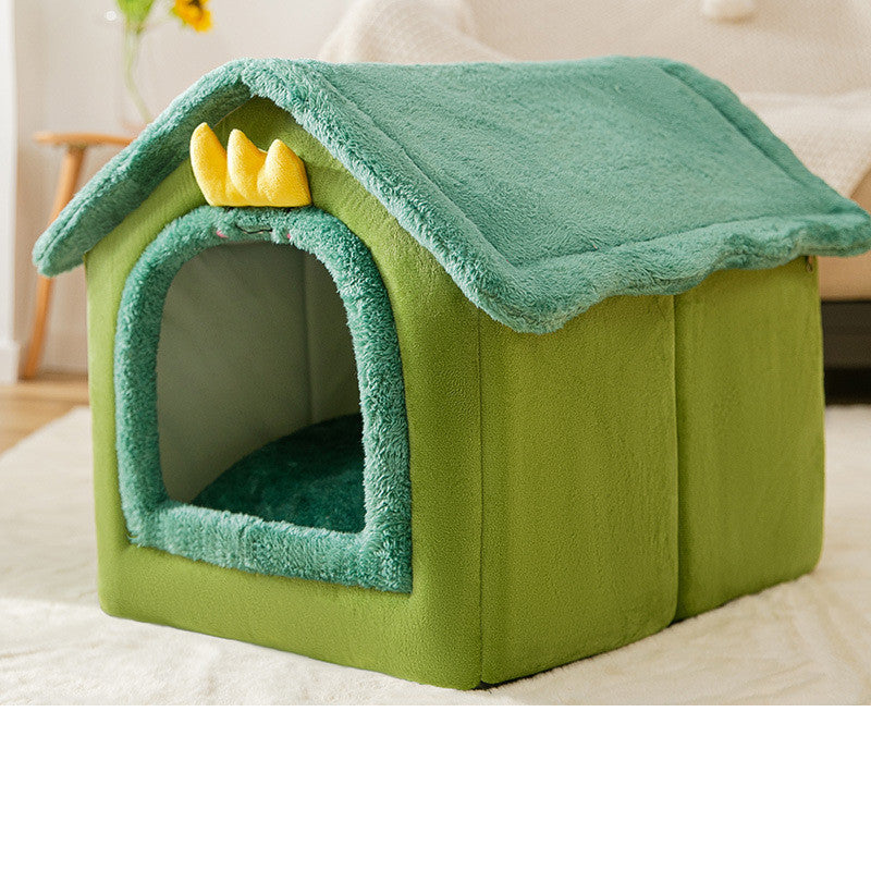 Green indoor pet house with plush fabric and decorative yellow crown – cozy foldable bed for cats and small dogs.