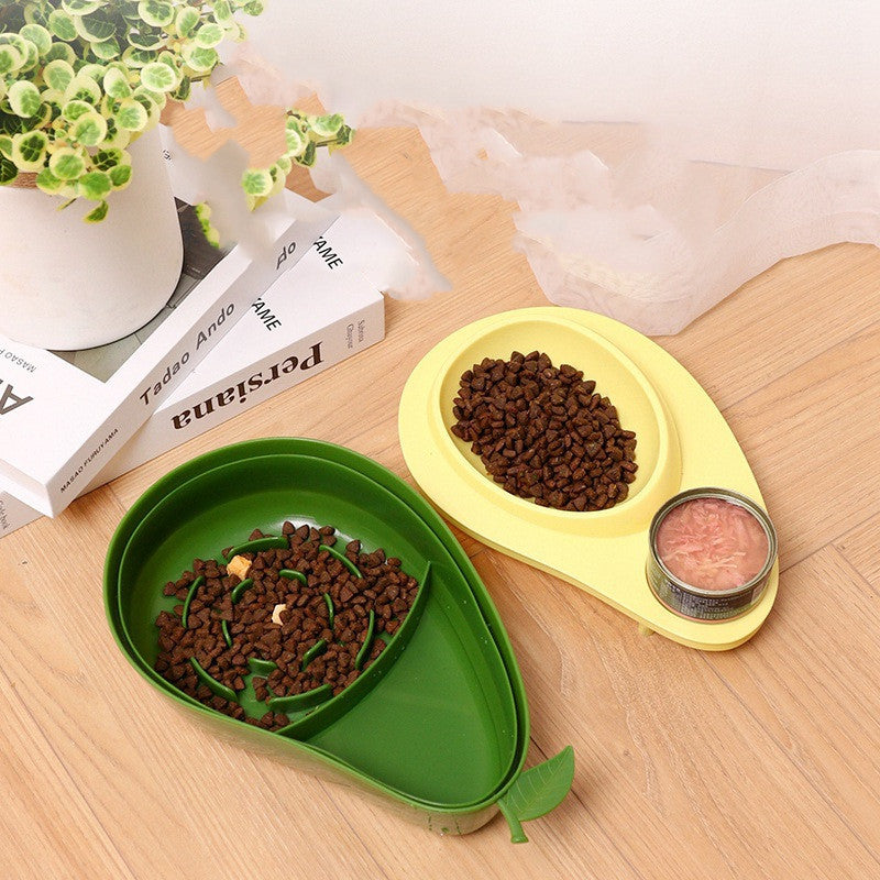 Green and yellow avocado-shaped pet bowls with dry and wet food — 2-in-1 slow feeder design for cats and dogs.