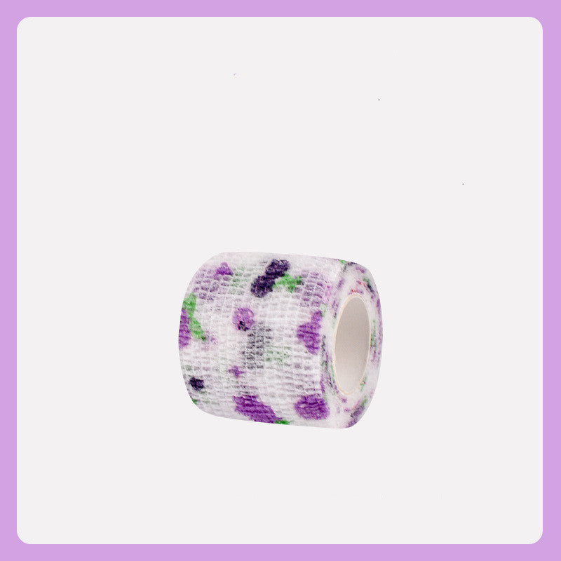 Roll of bandage with purple and green floral pattern on a white background