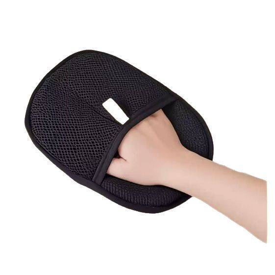 Washable reusable pet hair removal glove in action on fabric surface