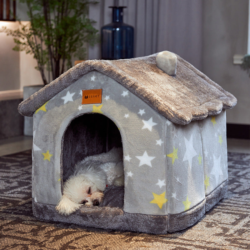 Small dog sleeping inside cozy indoor pet house with star pattern – soft foldable kennel bed for cats and dogs.