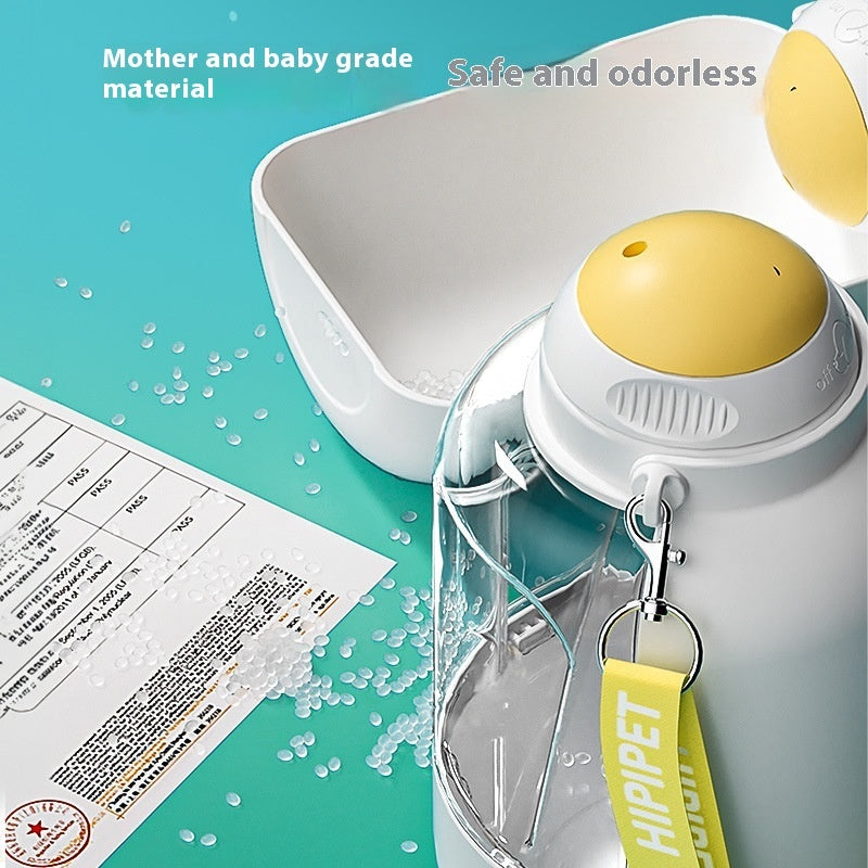 Hippet water bottle with yellow cap and strap on a teal background