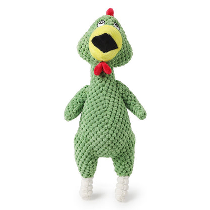 Green crochet toy with a face on a white background