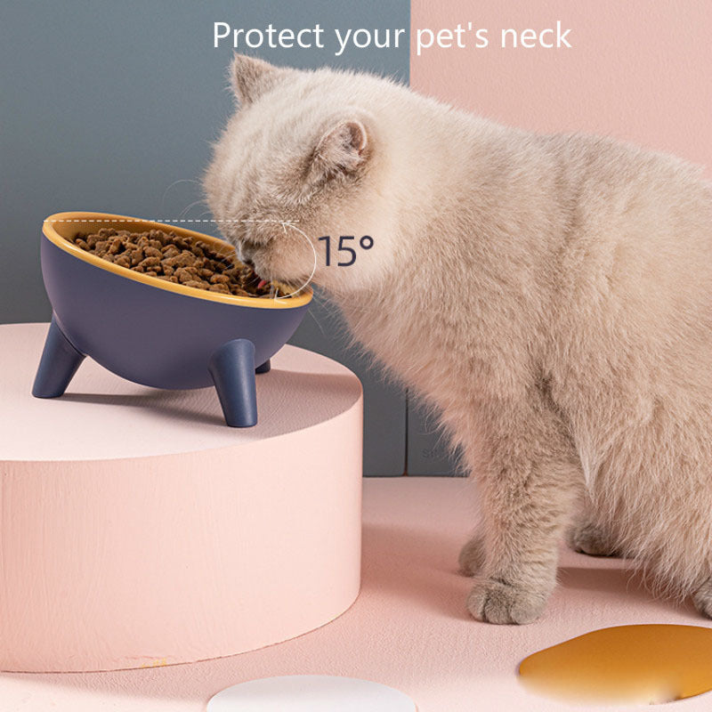 Cat eating from a blue and yellow pet bowl with text 'Protect your pet's neck' and '15°'.