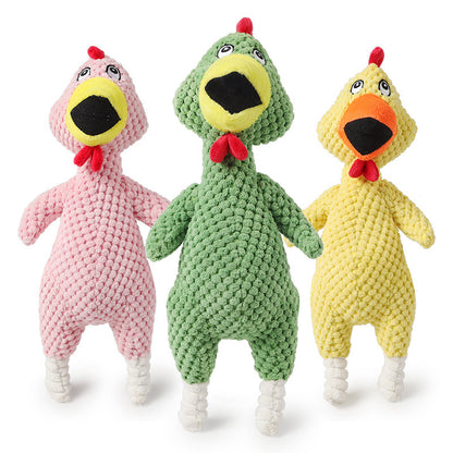 Three colorful knitted chicken toys in pink, green, and yellow on a white background.