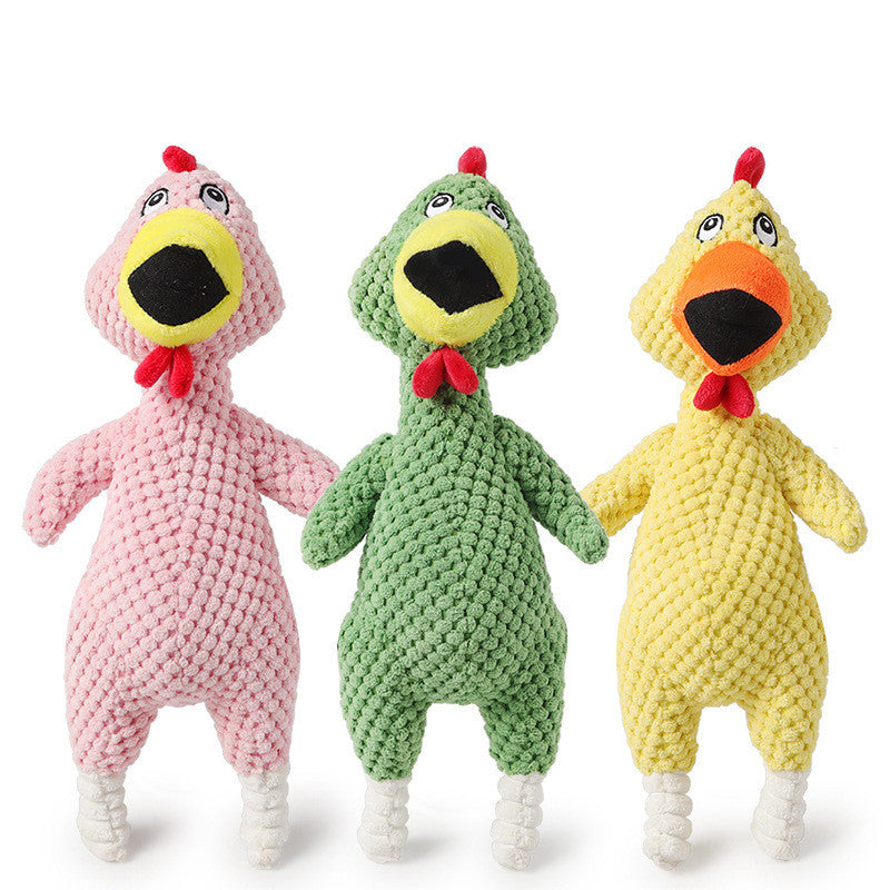 Three colorful knitted chicken toys in pink, green, and yellow on a white background