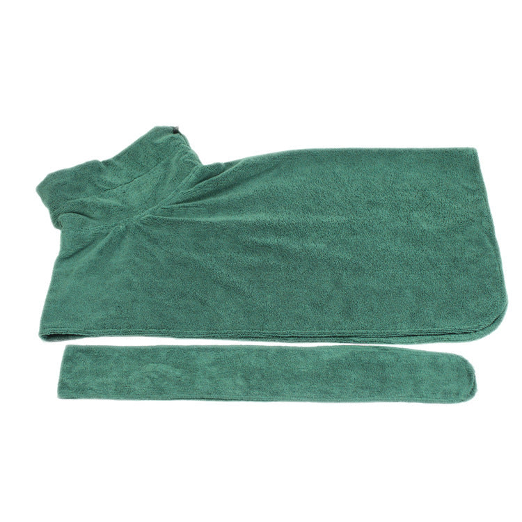 Green towel folded on a white background